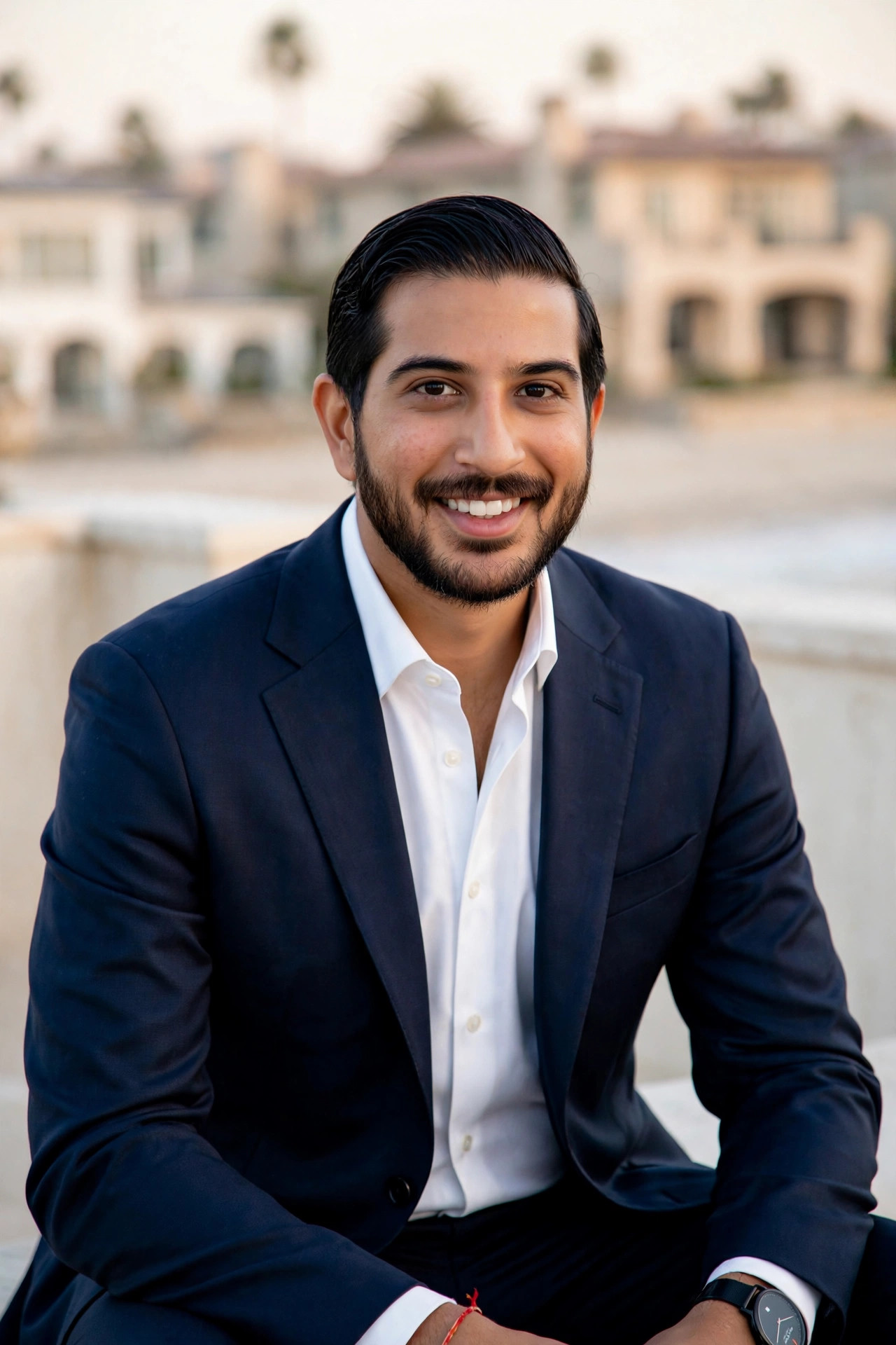 Professional headshot of Nishant Sehgal, San Diego luxury real estate agent