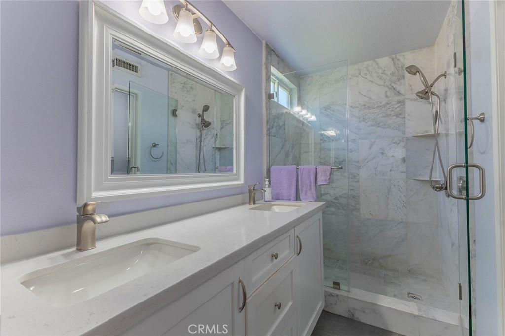 Remodeled primary bath with walk-in shower